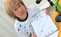 串田アキラさんの直筆サイン入り色紙